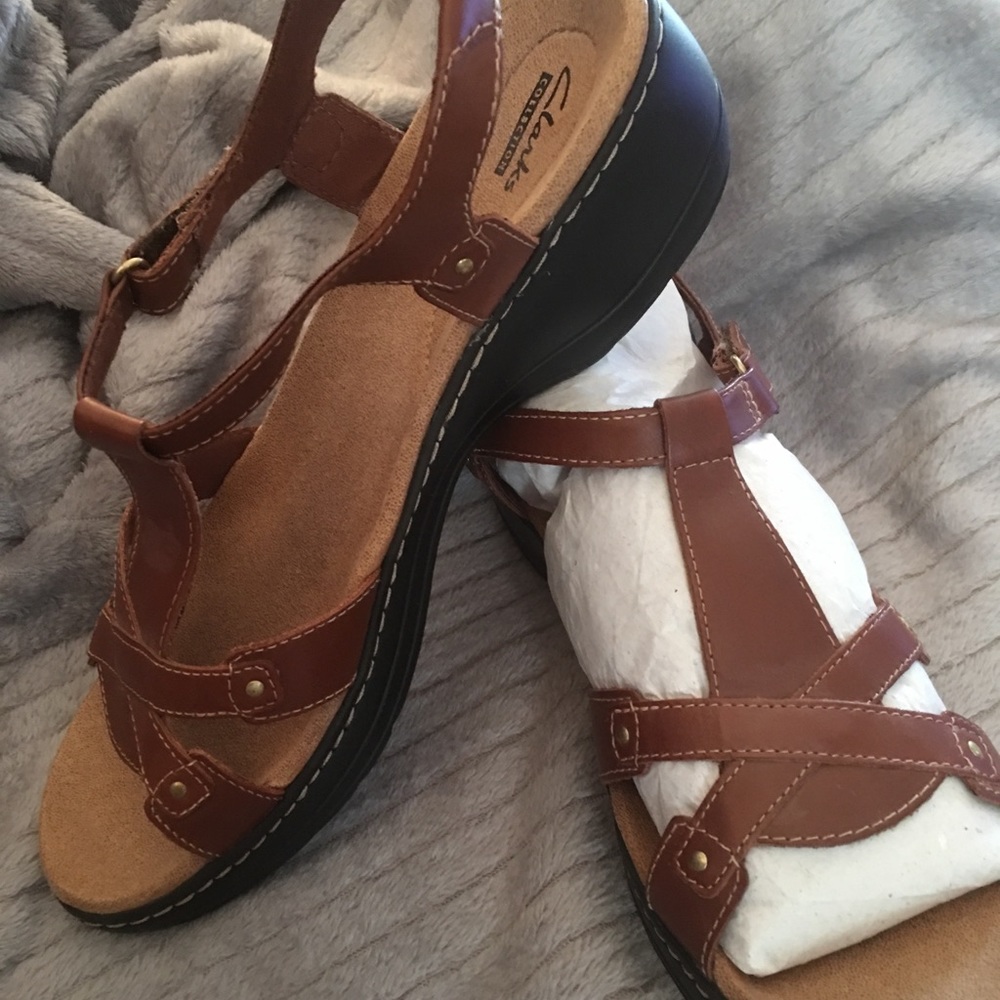 Clark’s sandals.